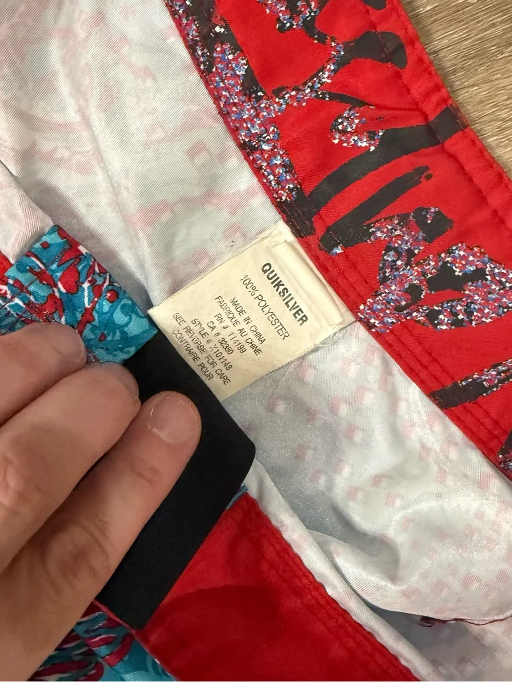 Quiksilver Turquoise & Red Winged Skull Print Swim Trunks